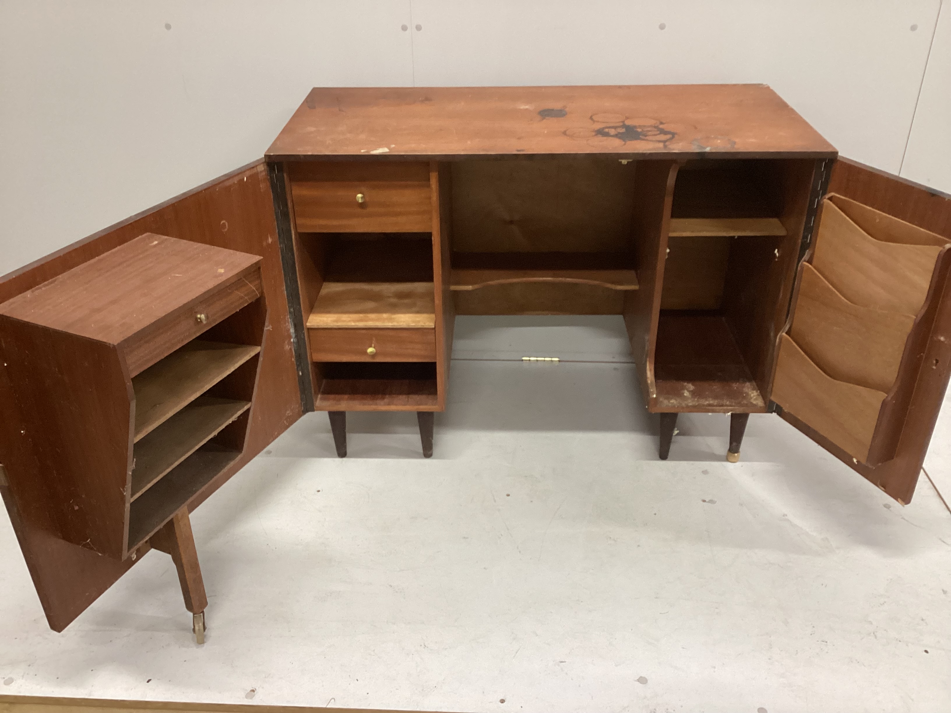 A mid century teak enclosed desk, width 106cm, depth 51cm, height 78cm